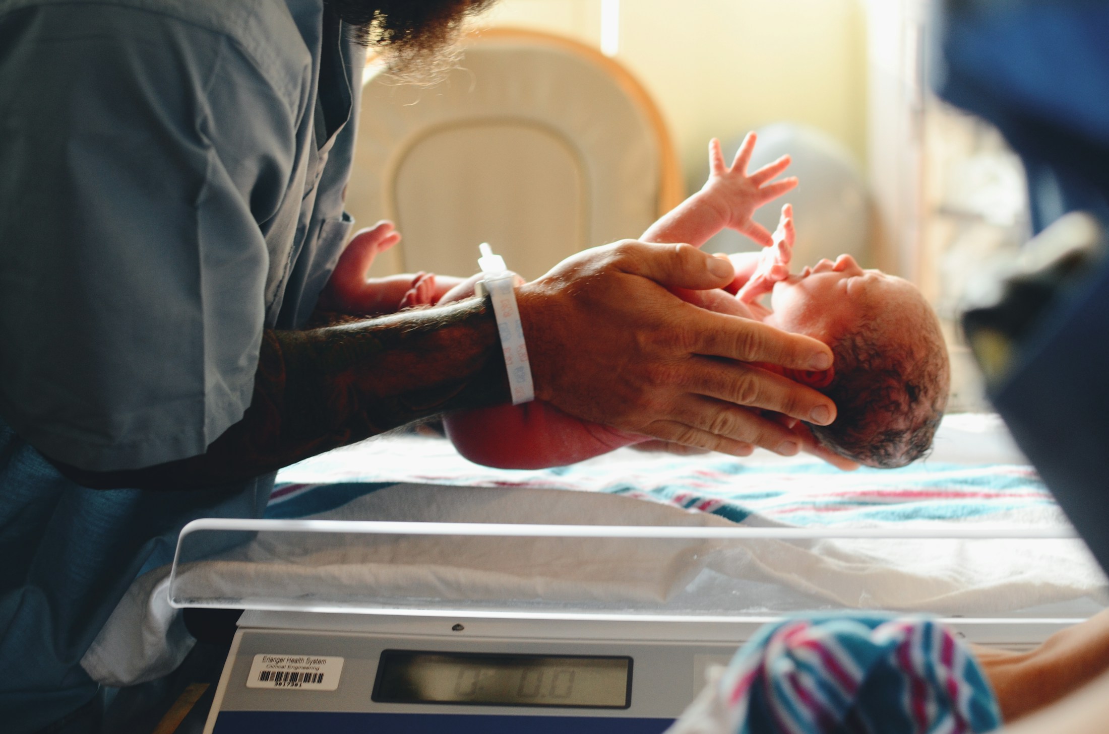 Newborn in hospital. Photo by Christian Bowen via Unsplash.